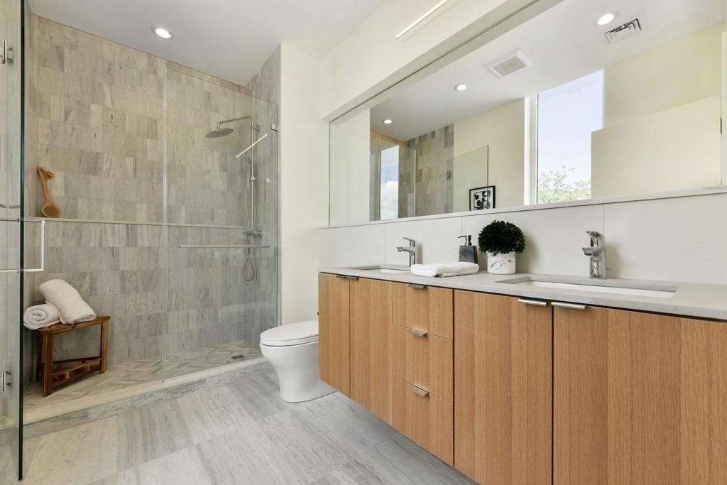 80 Terrace Street, Unit 302 Boston, MA 02120 - Photo 10 of 18 a bathroom with a sink and a mirror