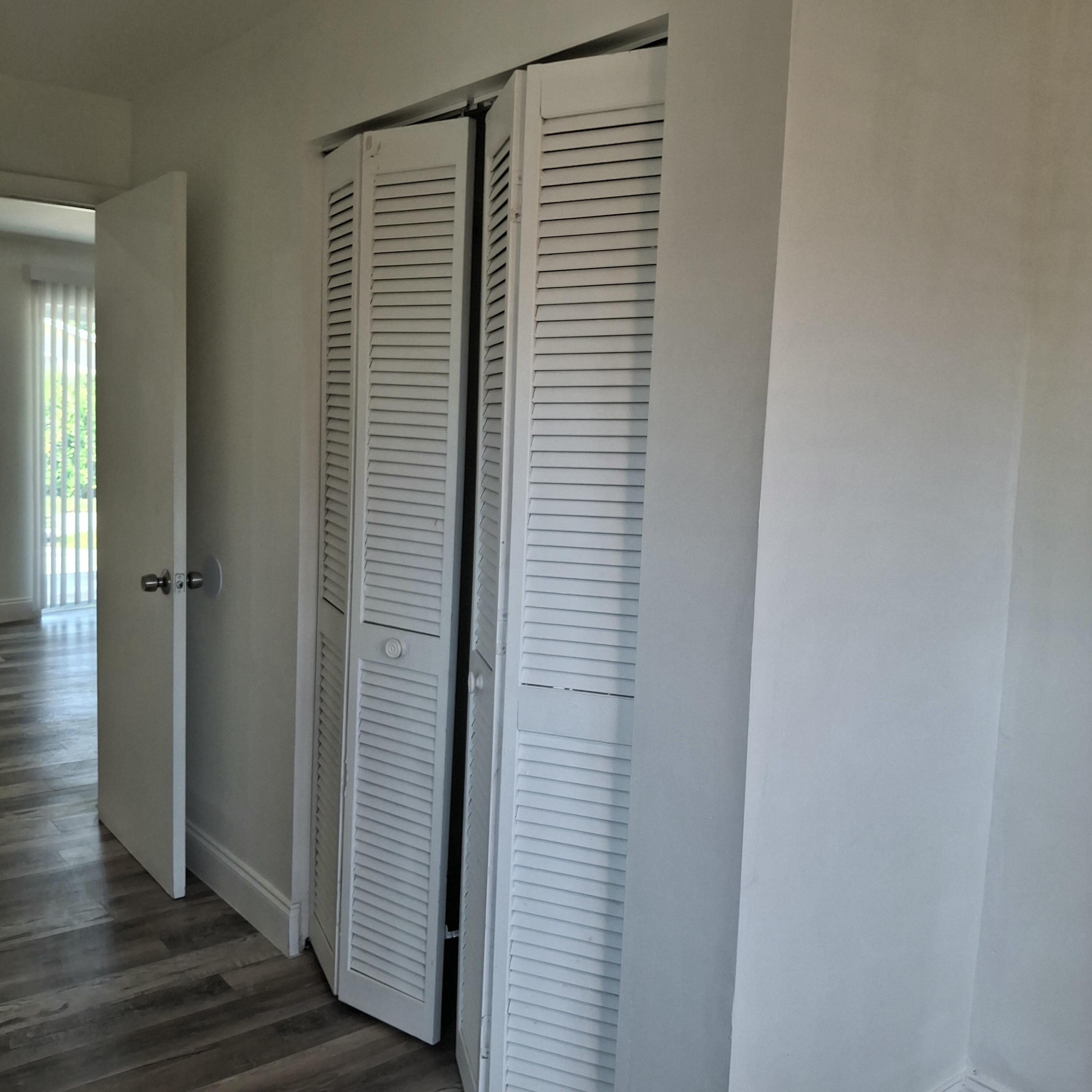 1097 Wilkinson Road, Unit B Lake Worth, FL 33462 - Photo 13 of 21 Closet 1