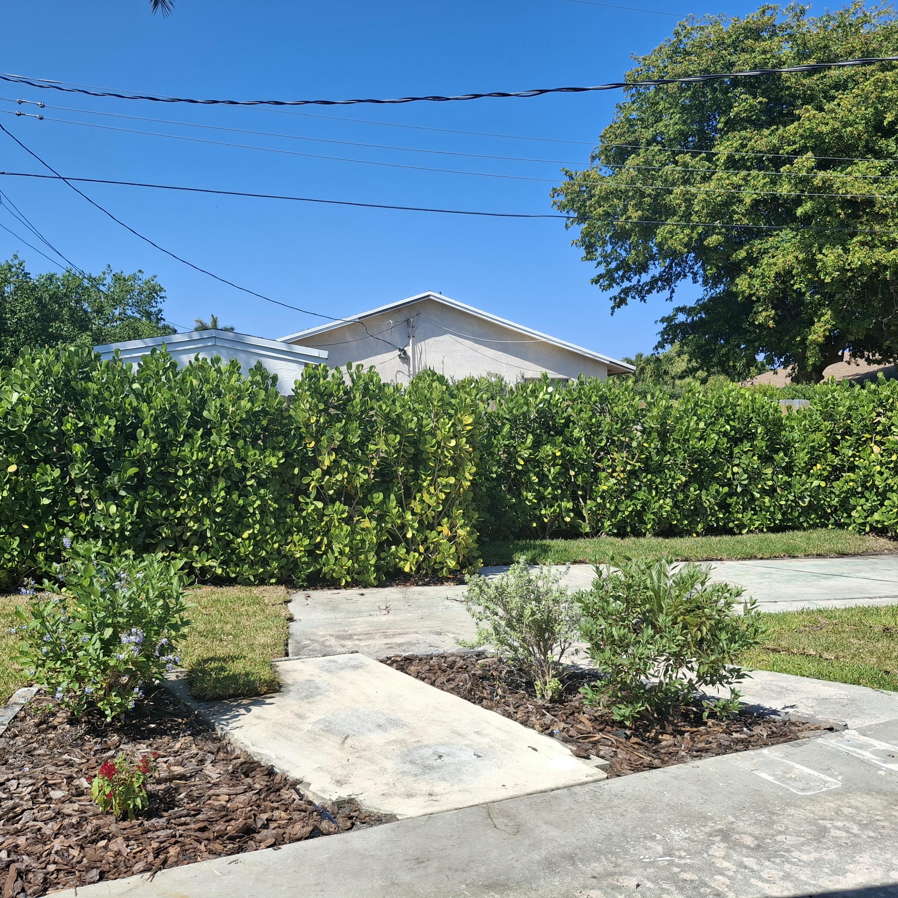 1097 Wilkinson Road, Unit B Lake Worth, FL 33462 - Photo 17 of 21 Backyard
