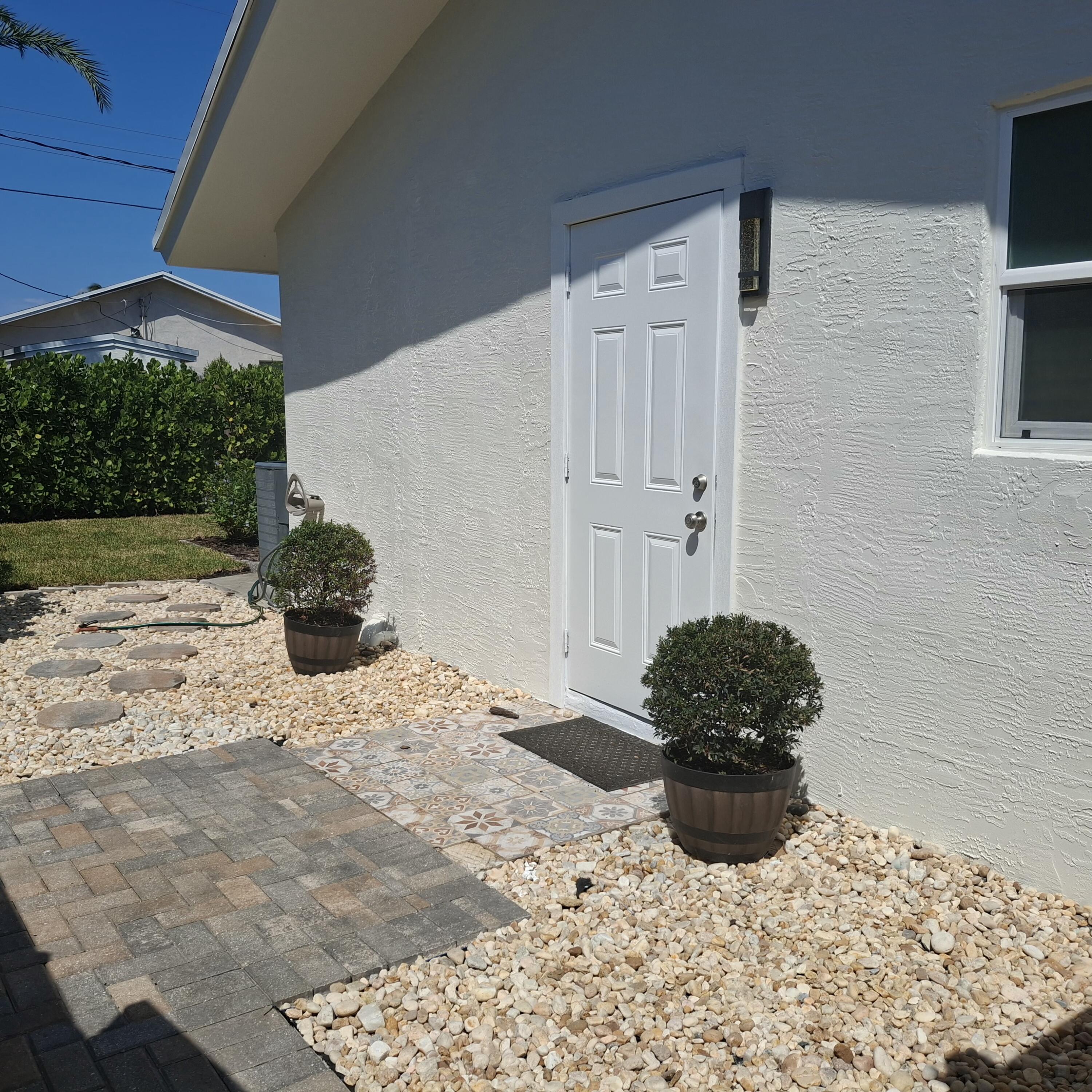 1097 Wilkinson Road, Unit B Lake Worth, FL 33462 - Photo 2 of 21 Entrance