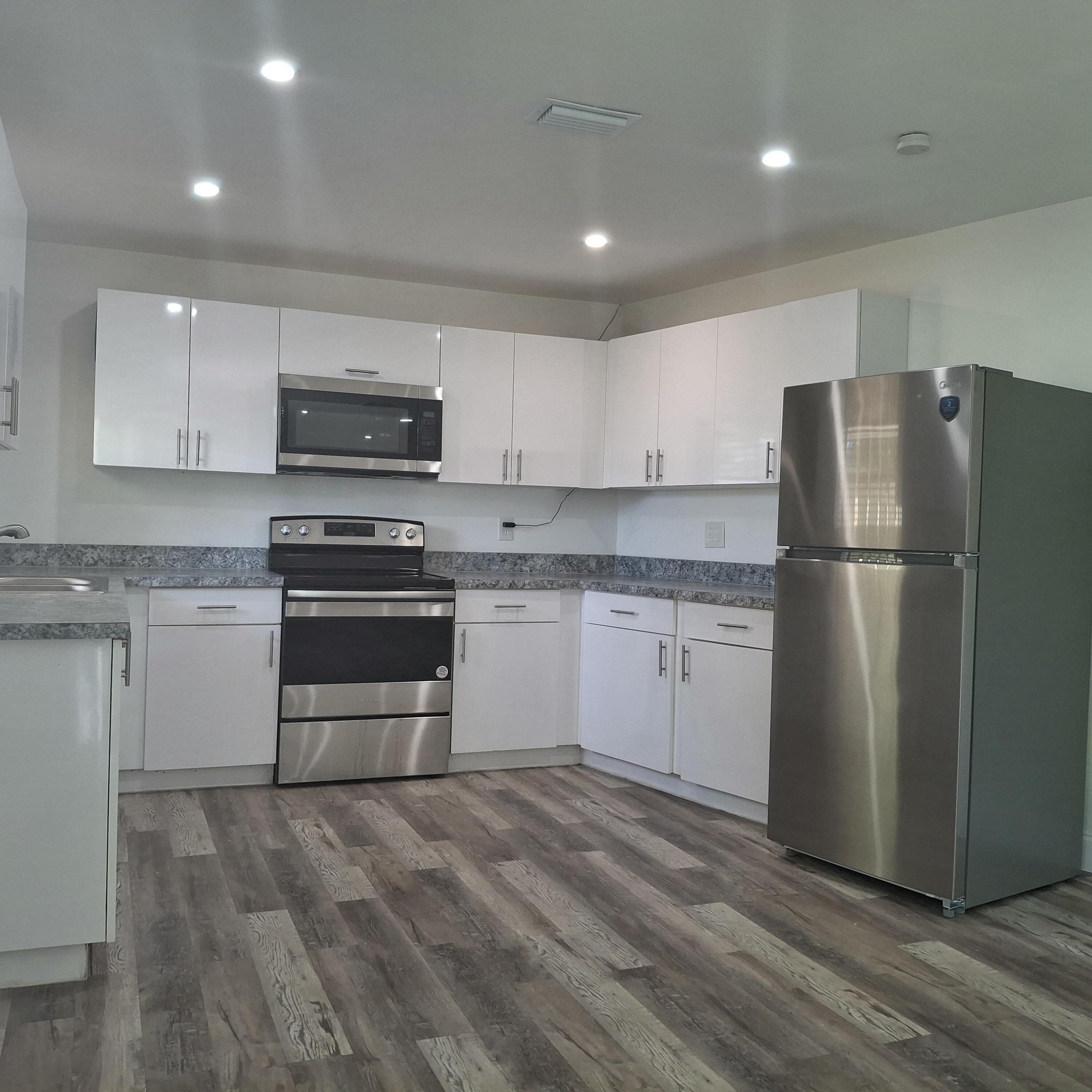1097 Wilkinson Road, Unit B Lake Worth, FL 33462 - Photo 7 of 21 Kitchen