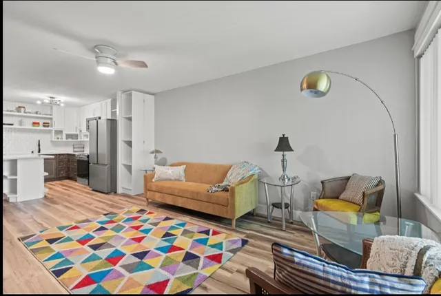 a living room with furniture and a couch