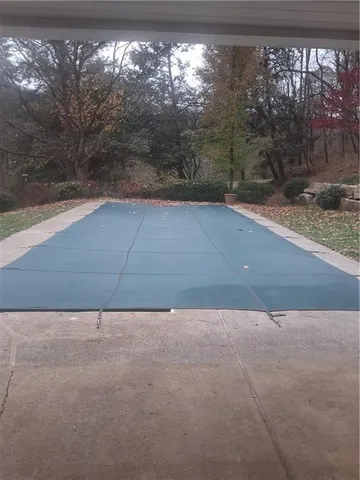 a view of backyard with green space