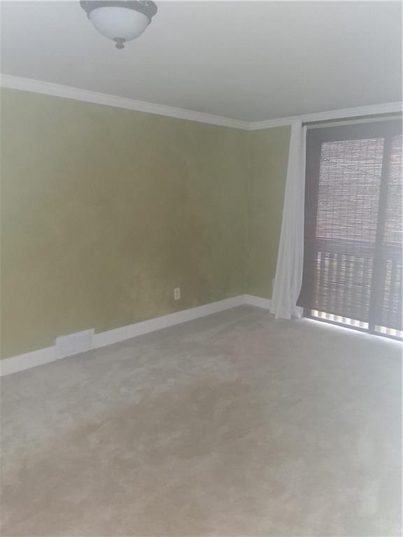 120 Hill Road Wexford, PA 15090 - Photo 10 of 12 a view of an empty room with a window