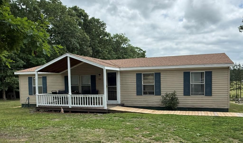 920 Pioneer Road Grimsley, TN 38565 - Photo 1 of 15 a view of a house with a yard and large trees