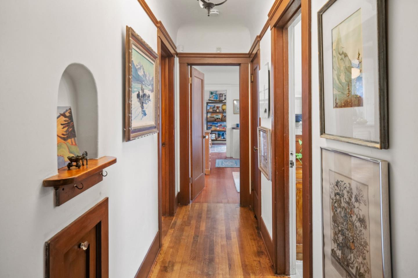 73 Echo Valley Road Salinas, CA 93907 - Photo 17 of 29 a view of hallway with wooden floor and stairs