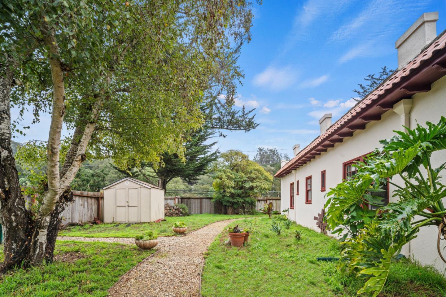 73 Echo Valley Road Salinas, CA 93907 - Photo 26 of 29 a front view of a house with a yard and trees