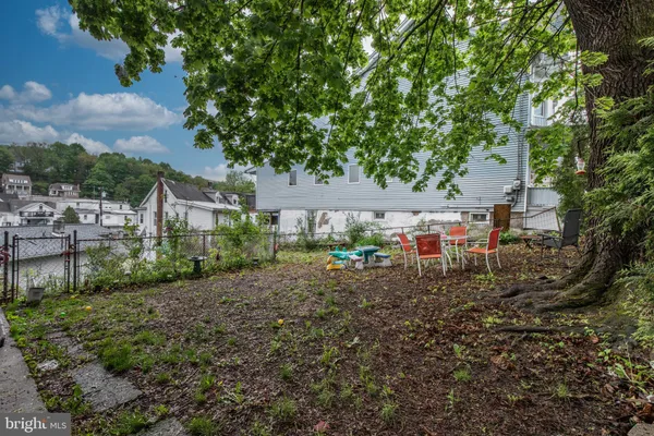 a aerial view of a house with a garden