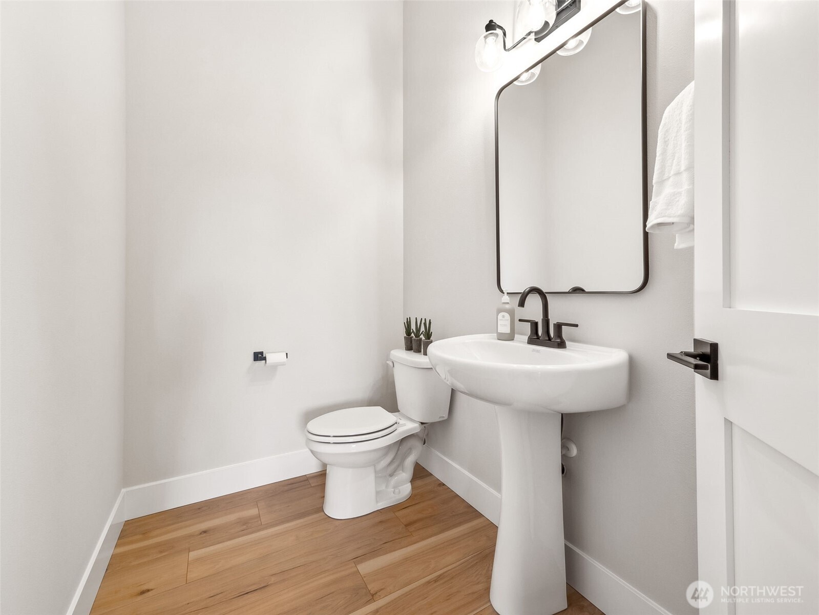 7226 227th Street East Graham, WA 98338 - Photo 13 of 31 a bathroom with a sink and a mirror