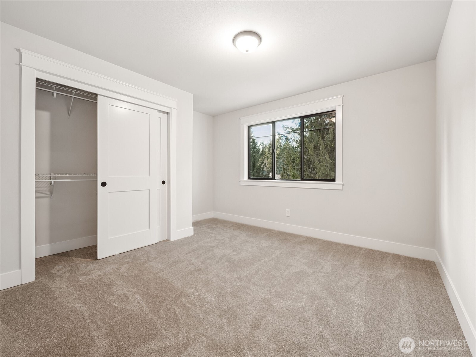 7226 227th Street East Graham, WA 98338 - Photo 15 of 31 an empty room with windows
