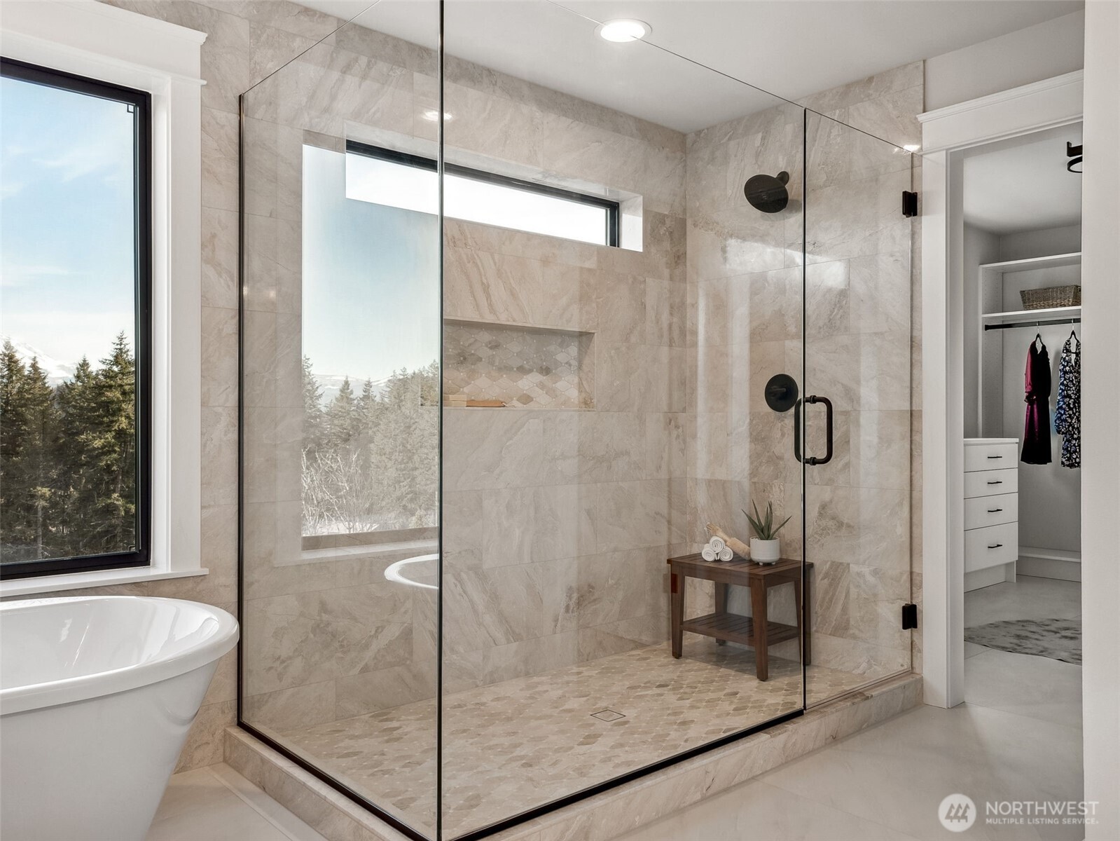 7226 227th Street East Graham, WA 98338 - Photo 23 of 31 a bathroom with a shower and bathtub