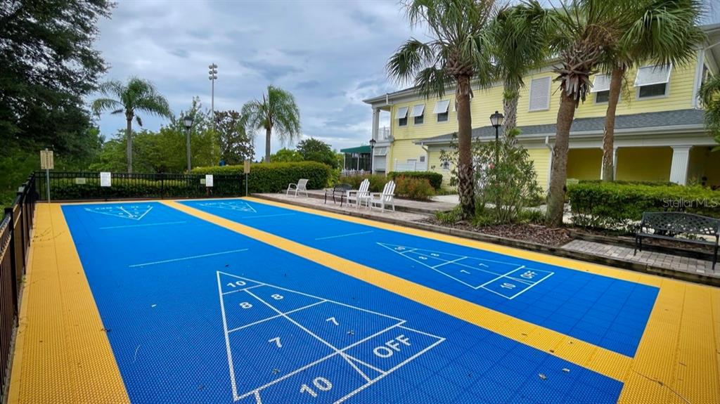 202 Rum Run, Unit 36102 Davenport, FL 33897 - Photo 18 of 21 a view of swimming pool with outdoor seating and yard