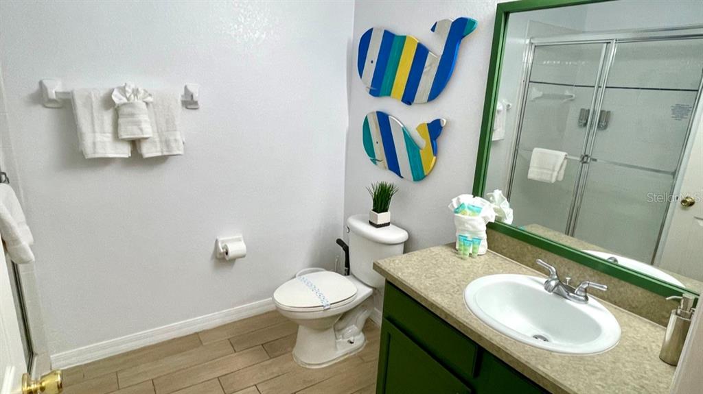 202 Rum Run, Unit 36102 Davenport, FL 33897 - Photo 10 of 21 a bathroom with a sink and toilet