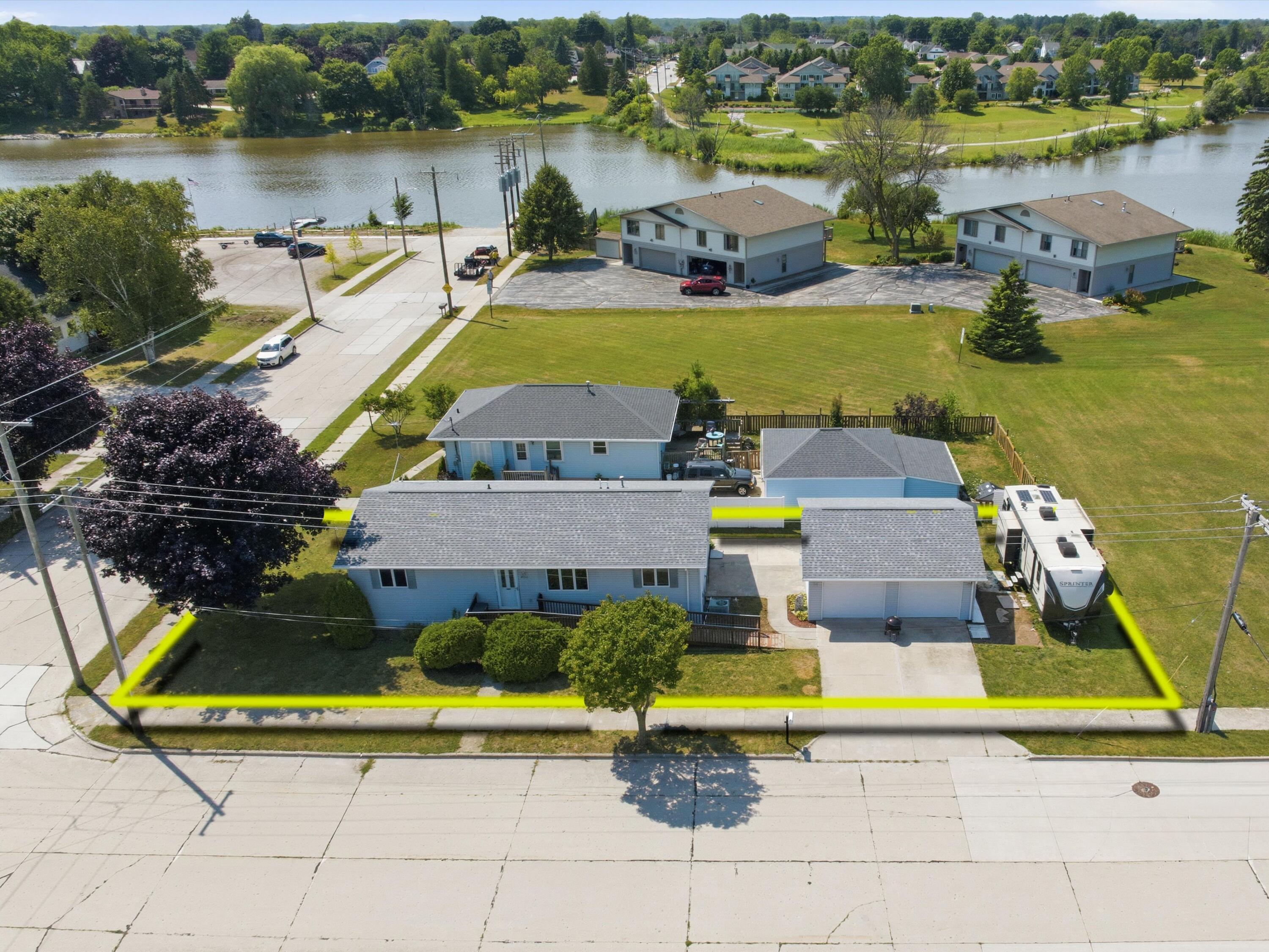 2702 Wilson Street Two Rivers, WI 54241 - Photo 1 of 43 02-DJI_20260803085605_0067_D-Edit