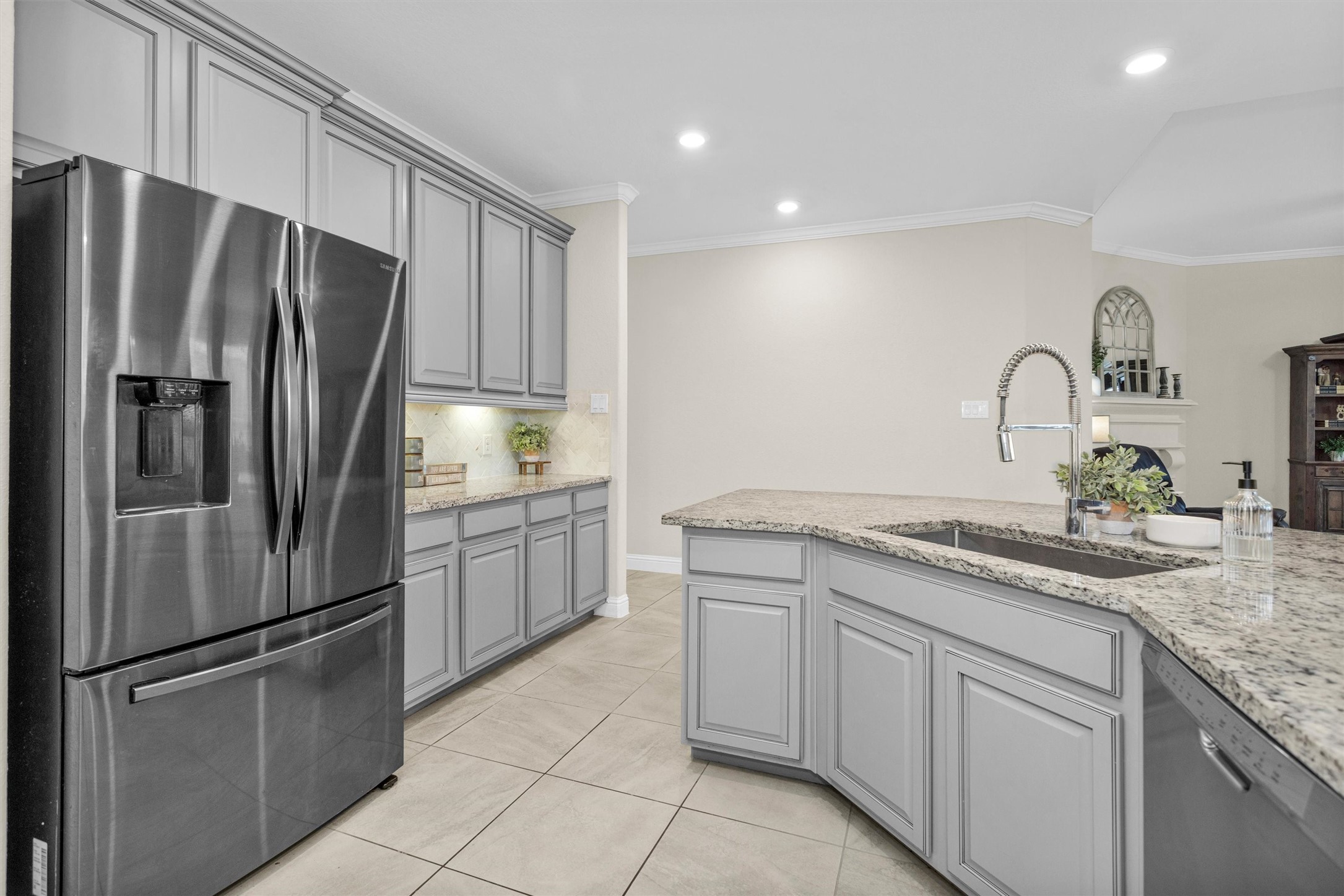 3622 Lister Drive Rosharon, TX 77583 - Photo 14 of 44 a kitchen with stainless steel appliances granite countertop a refrigerator sink and stove