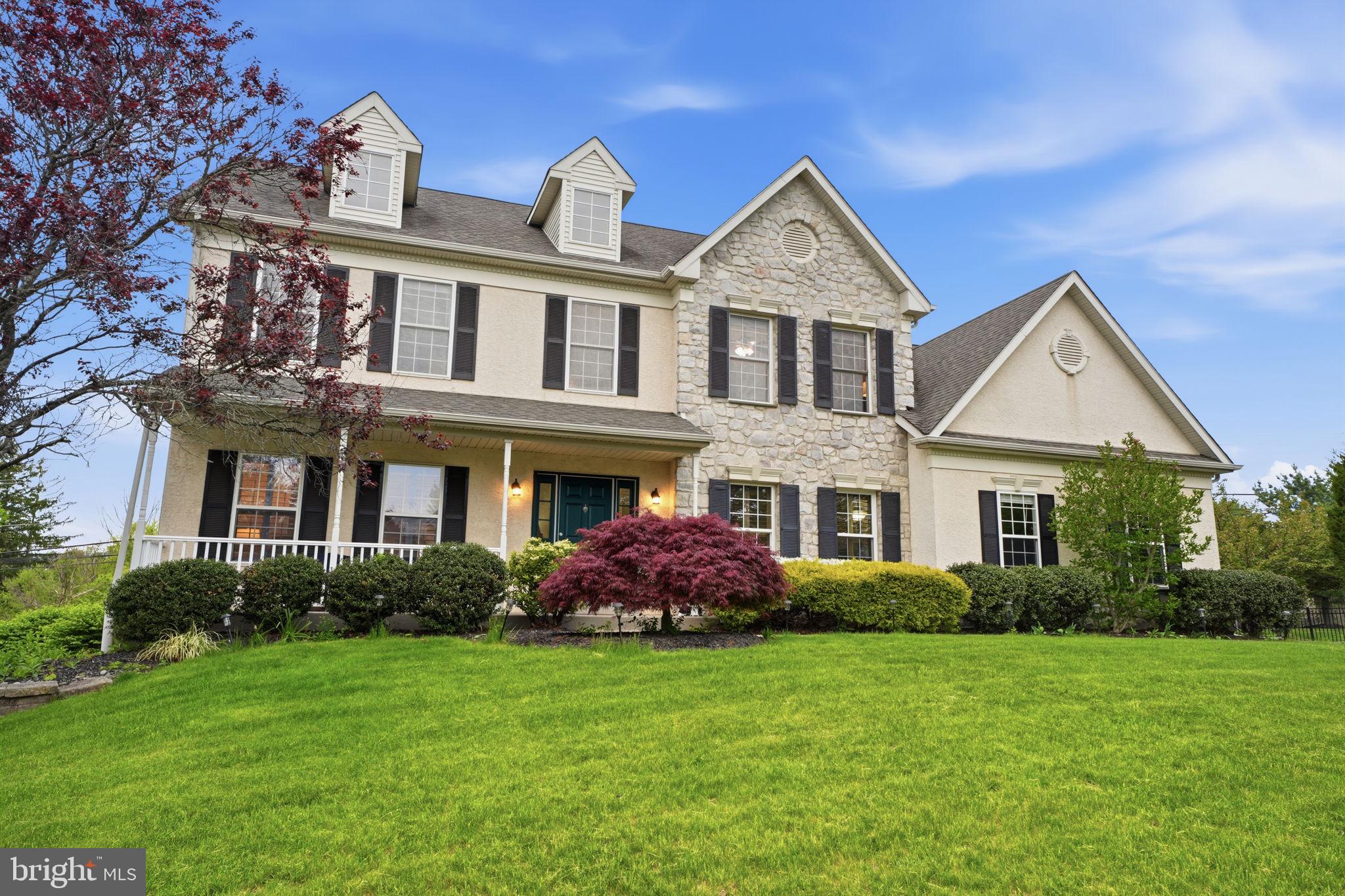 139 Statesman Road Chalfont, PA 18914 - Photo 1 of 64 a front view of a house with garden
