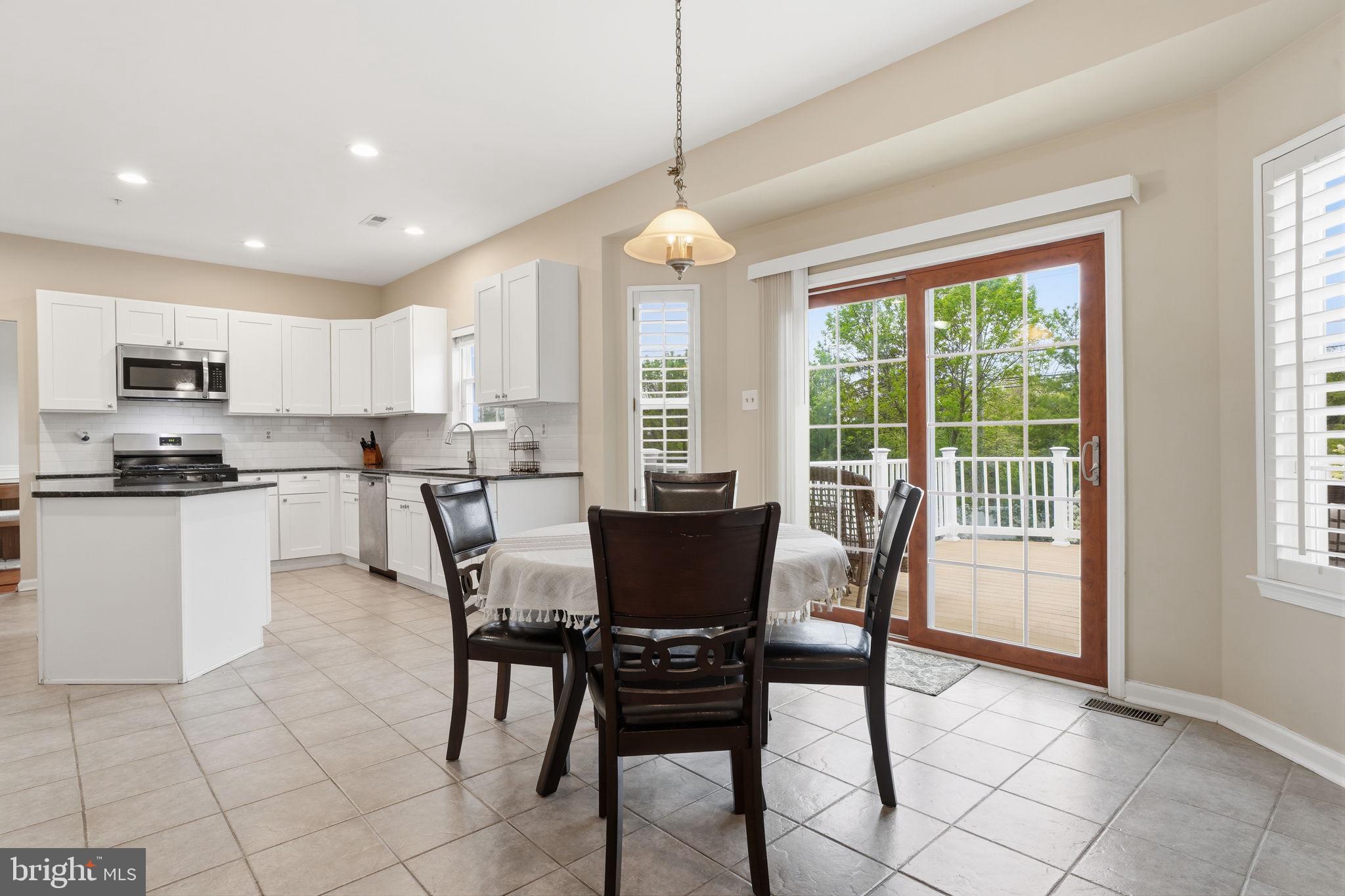 139 Statesman Road Chalfont, PA 18914 - Photo 14 of 64 a view of a dining room with furniture window and outside view