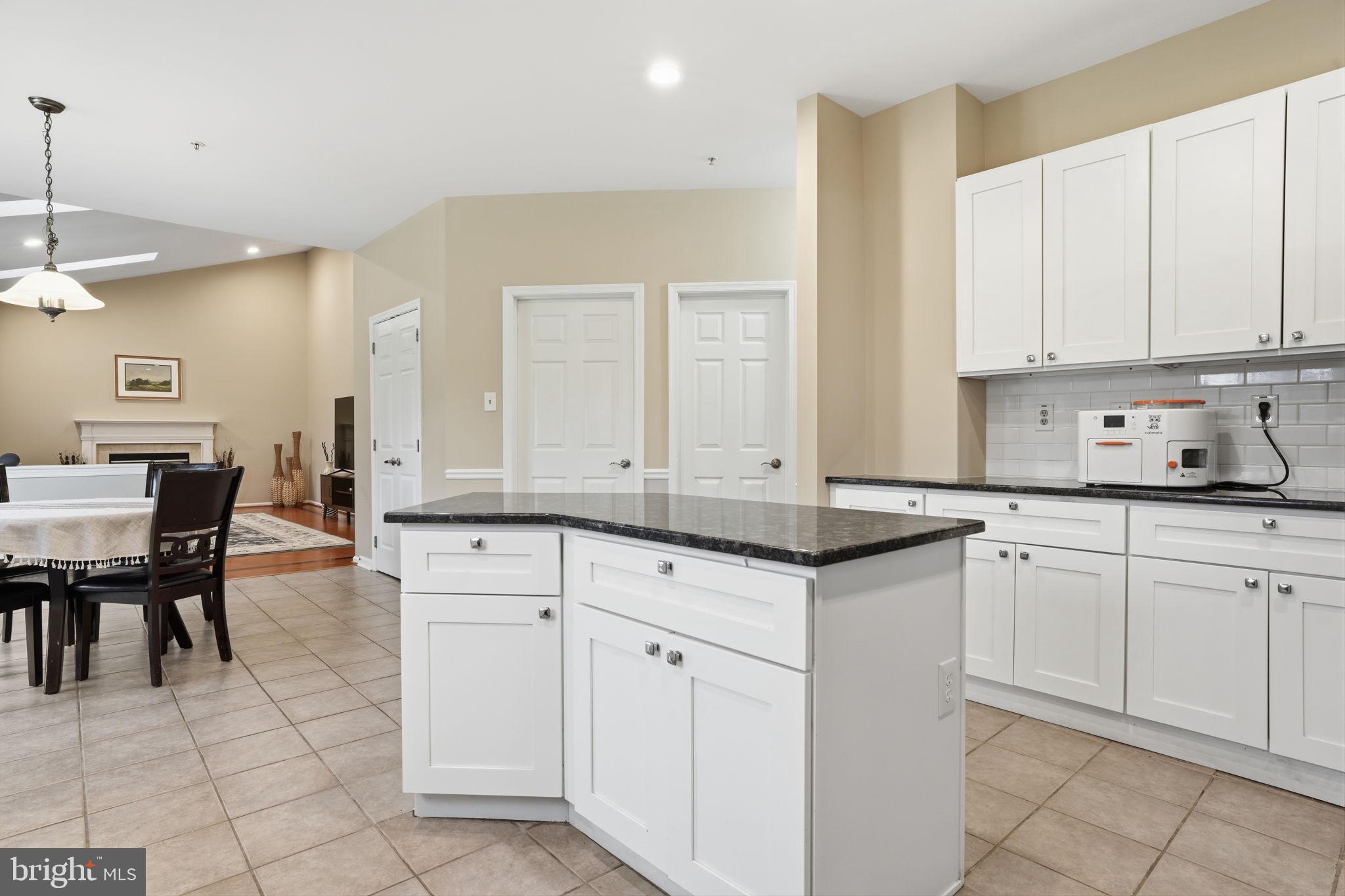 139 Statesman Road Chalfont, PA 18914 - Photo 15 of 64 a kitchen with granite countertop white cabinets white appliances with a sink and dishwasher