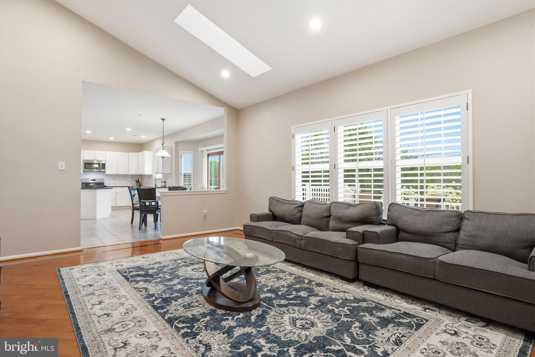 139 Statesman Road Chalfont, PA 18914 - Photo 18 of 64 a living room with furniture and a table