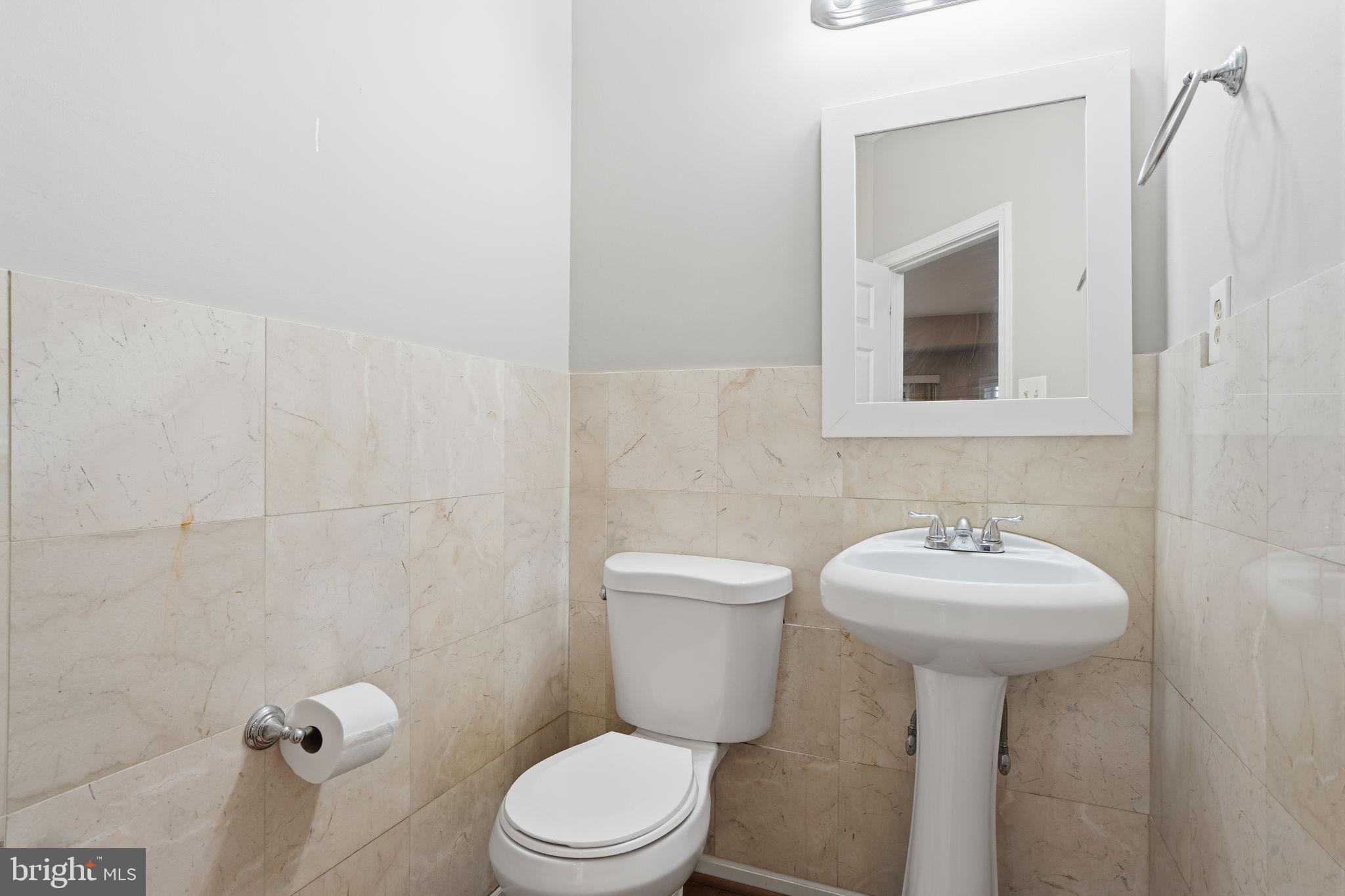 139 Statesman Road Chalfont, PA 18914 - Photo 20 of 64 Sleek and modern half-bath retreat.