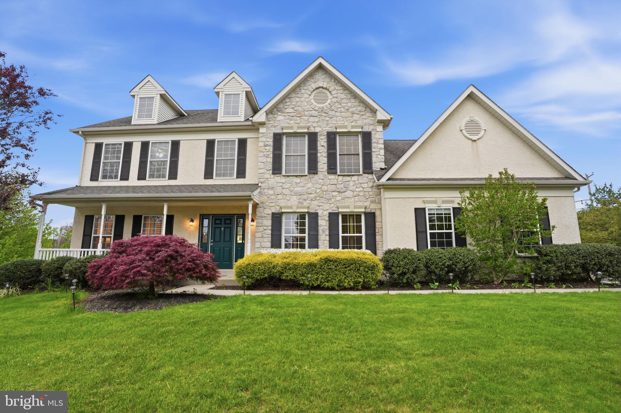 139 Statesman Road Chalfont, PA 18914 - Photo 2 of 64 a front view of a house with garden