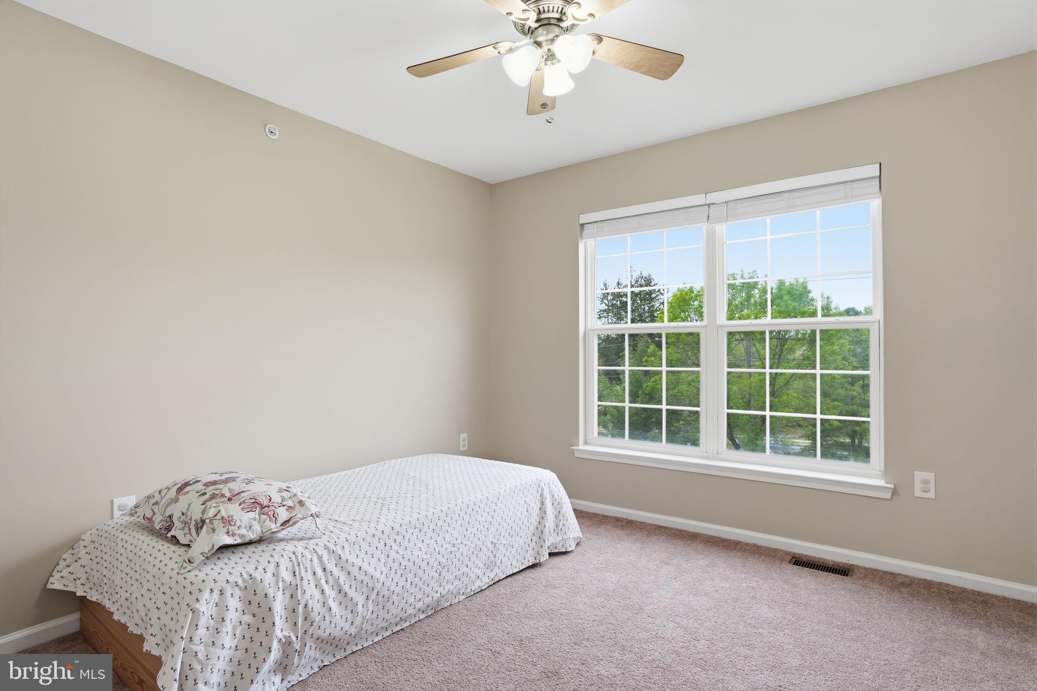 139 Statesman Road Chalfont, PA 18914 - Photo 28 of 64 a bedroom with a bed and a window