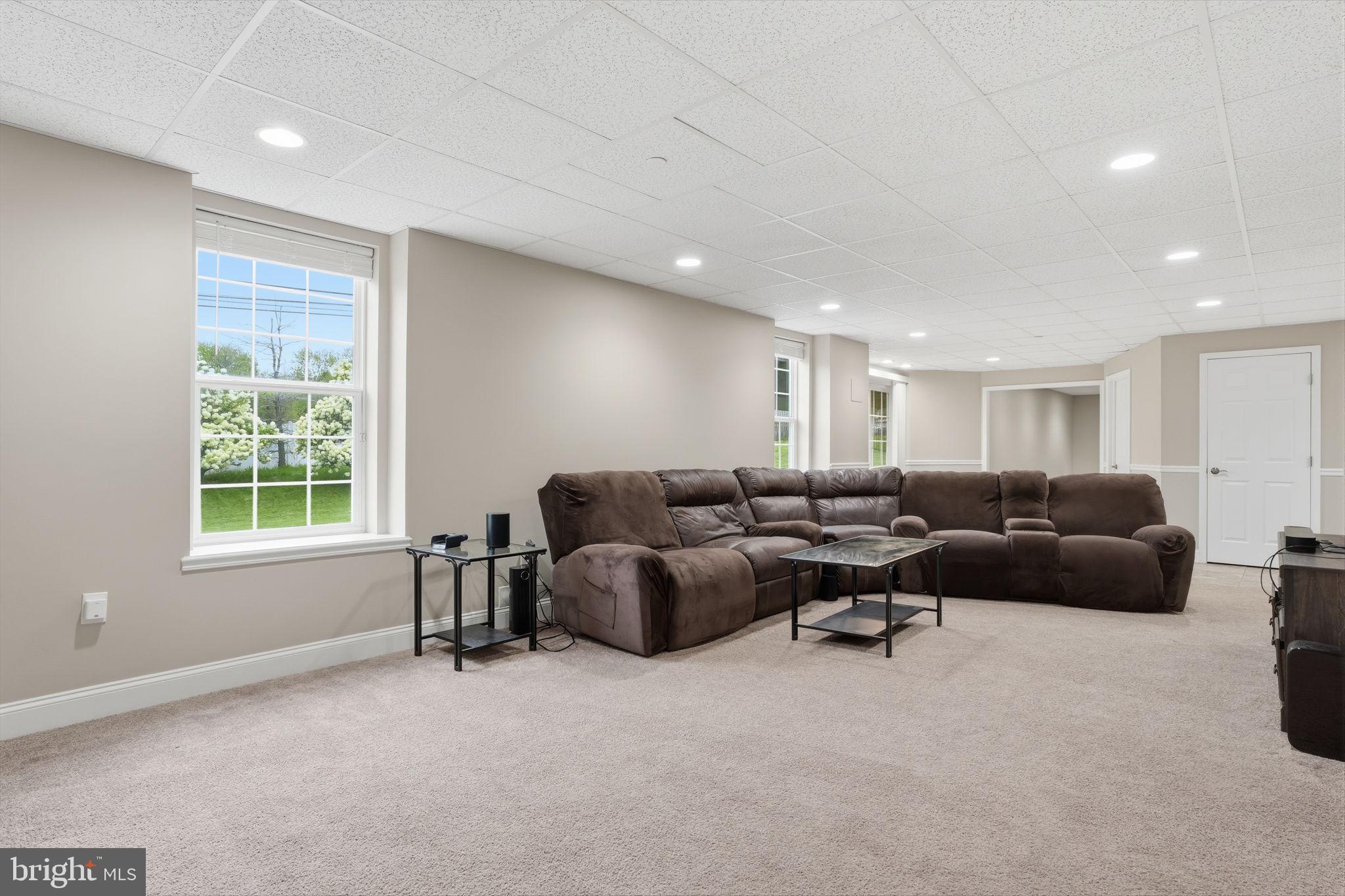 139 Statesman Road Chalfont, PA 18914 - Photo 39 of 64 a living room with furniture and a window