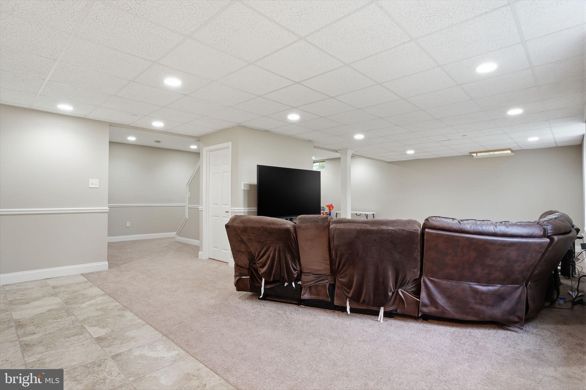 139 Statesman Road Chalfont, PA 18914 - Photo 44 of 64 Spacious, inviting lower-level retreat.