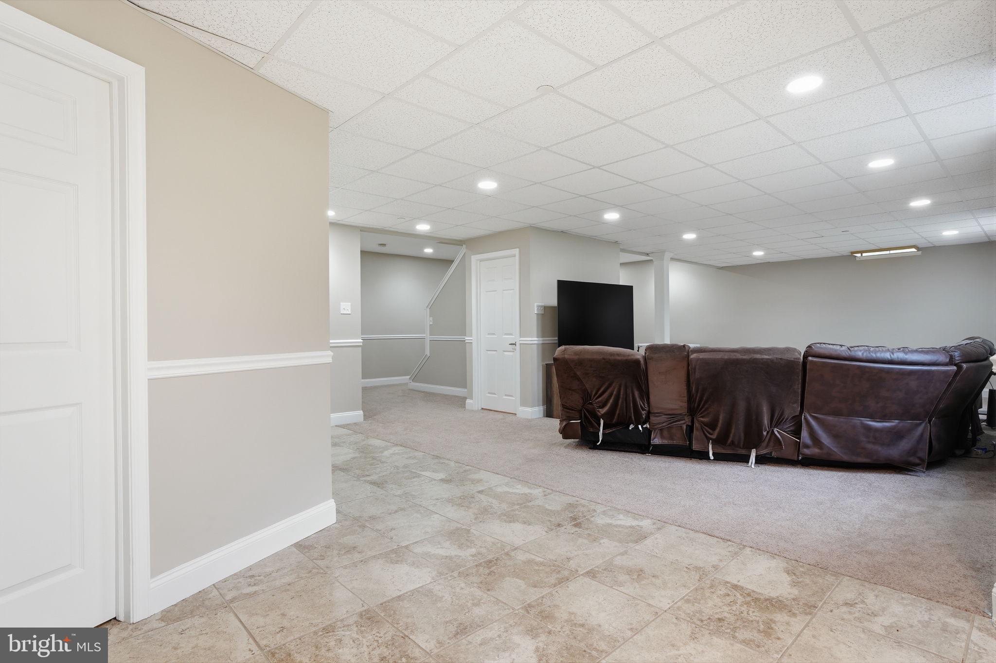 139 Statesman Road Chalfont, PA 18914 - Photo 47 of 64 Spacious, modern basement retreat.
