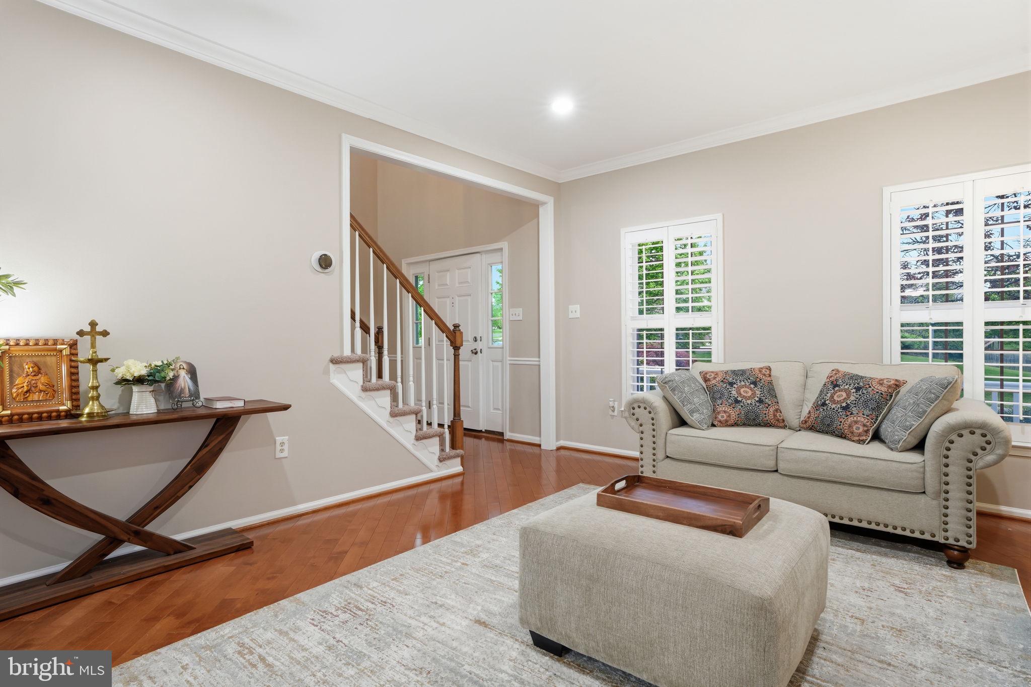139 Statesman Road Chalfont, PA 18914 - Photo 50 of 64 a living room with furniture and a window