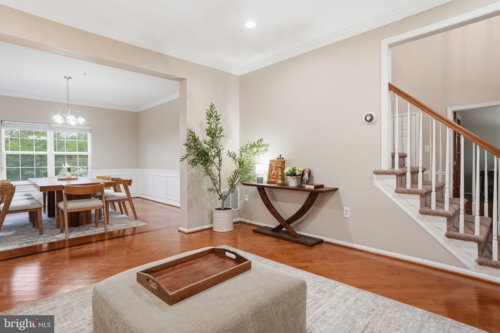139 Statesman Road Chalfont, PA 18914 - Photo 52 of 64 a living room with furniture a window and wooden floor