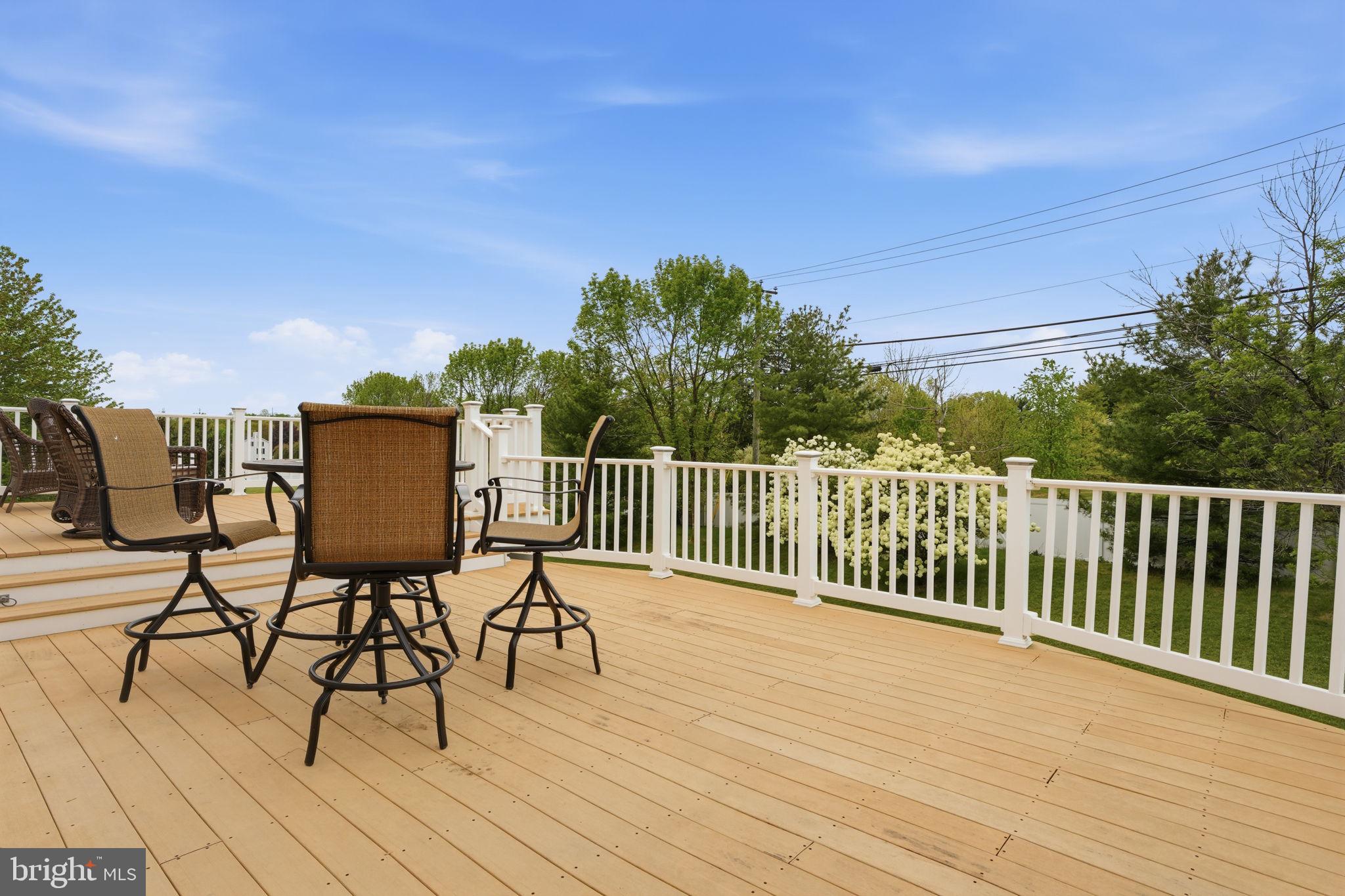 139 Statesman Road Chalfont, PA 18914 - Photo 54 of 64 a view of a chairs and table on the wooden floor