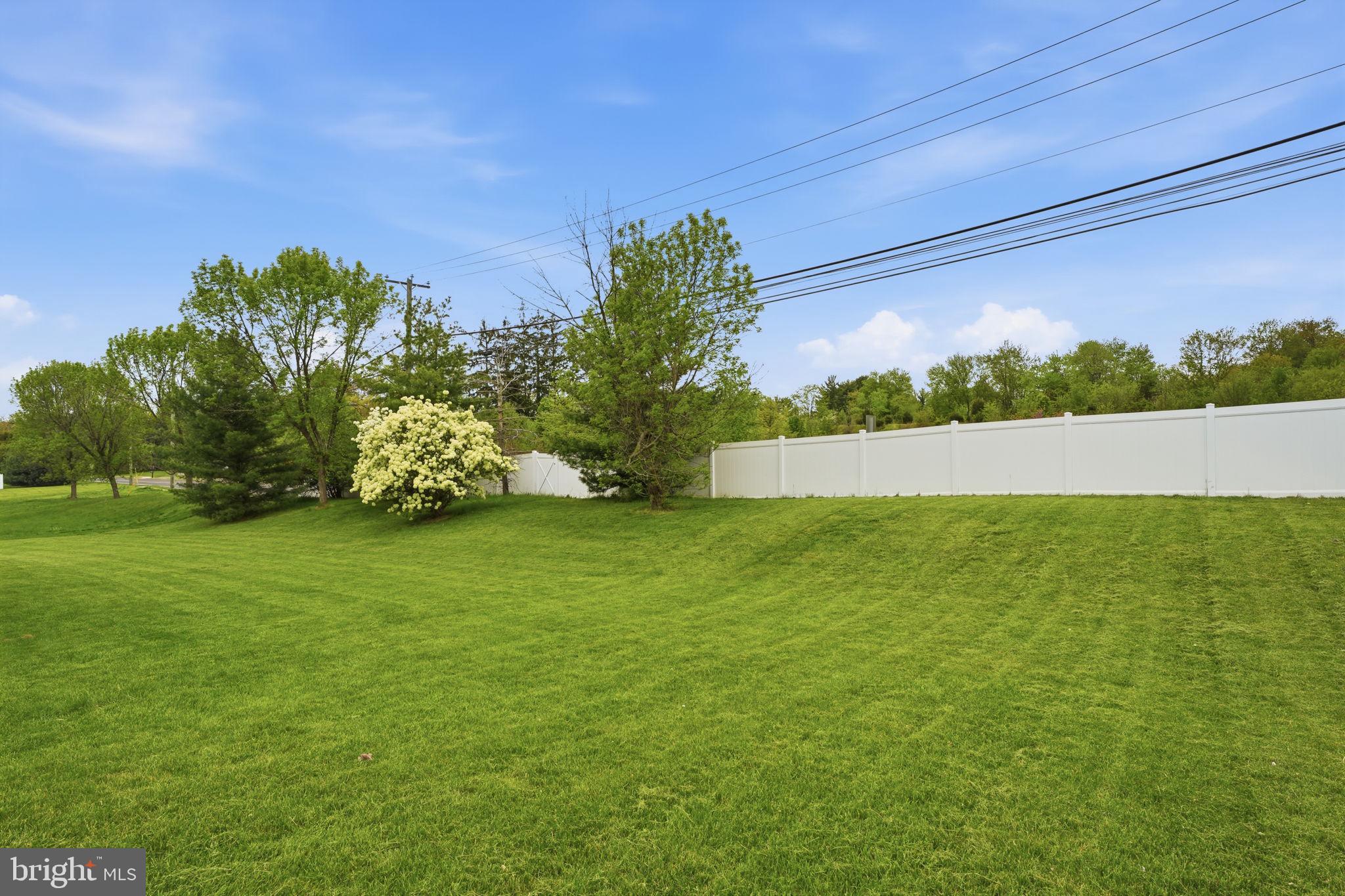 139 Statesman Road Chalfont, PA 18914 - Photo 57 of 64 a view of yard with swimming pool and green space