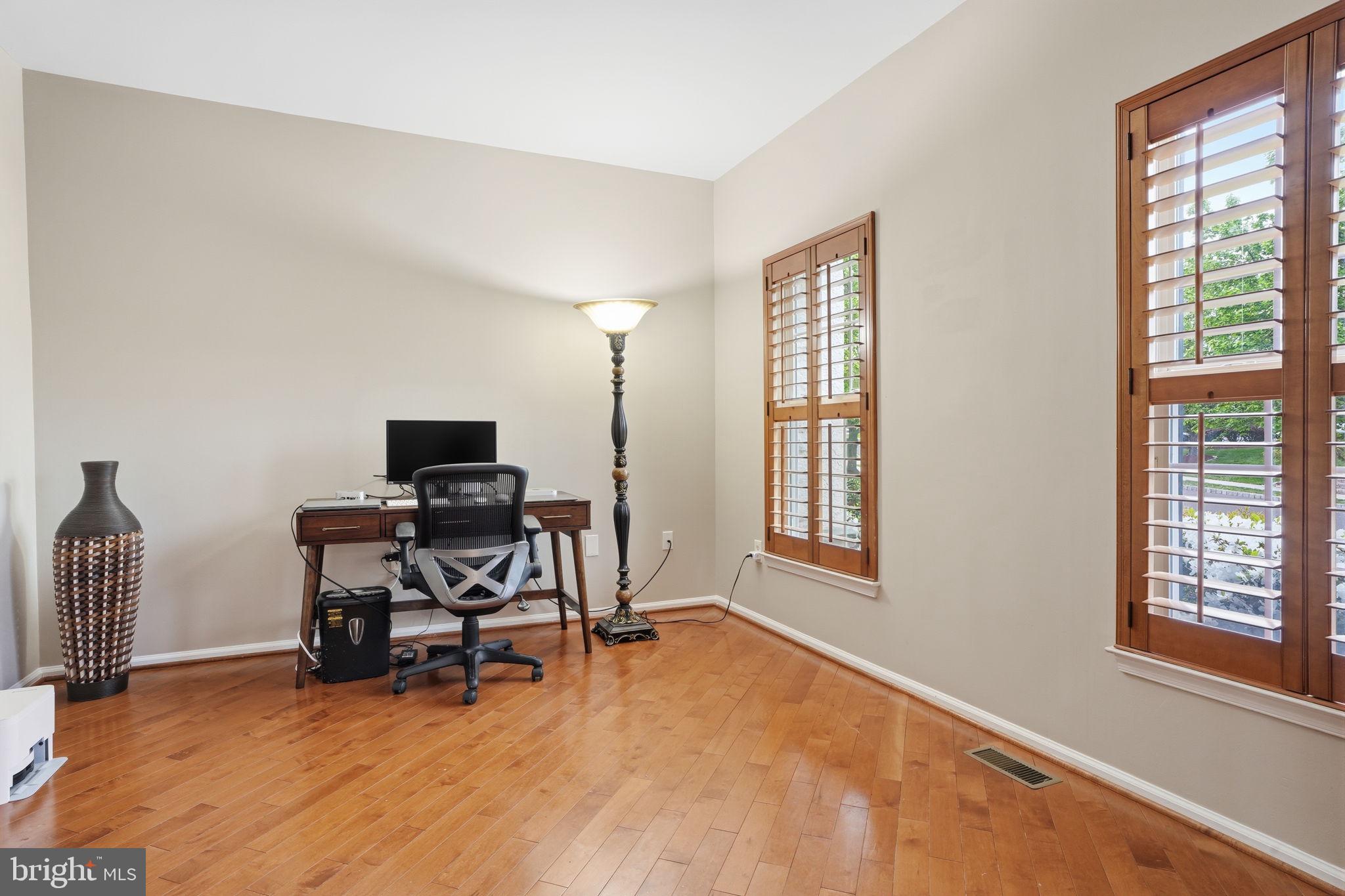 139 Statesman Road Chalfont, PA 18914 - Photo 6 of 64 a view of a workspace with furniture and a window
