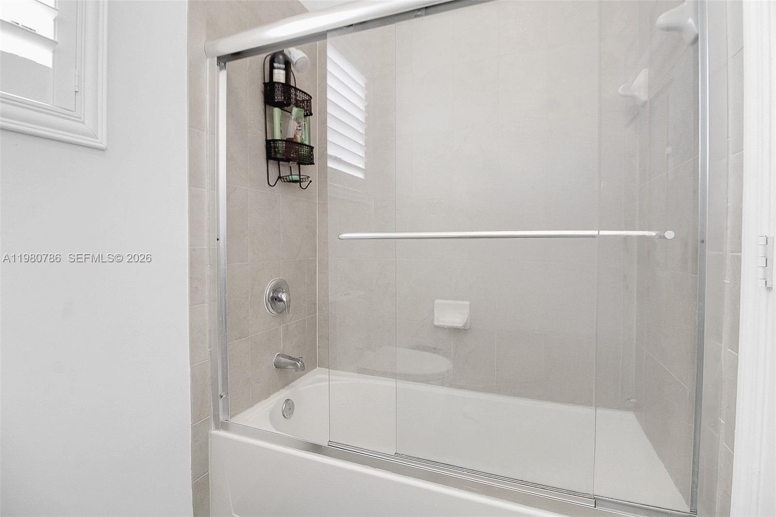 17343 Southwest 155th Court Miami, FL 33187 - Photo 22 of 40 ENJOY A SHOWER OR TAKE A RELAXING BATH!