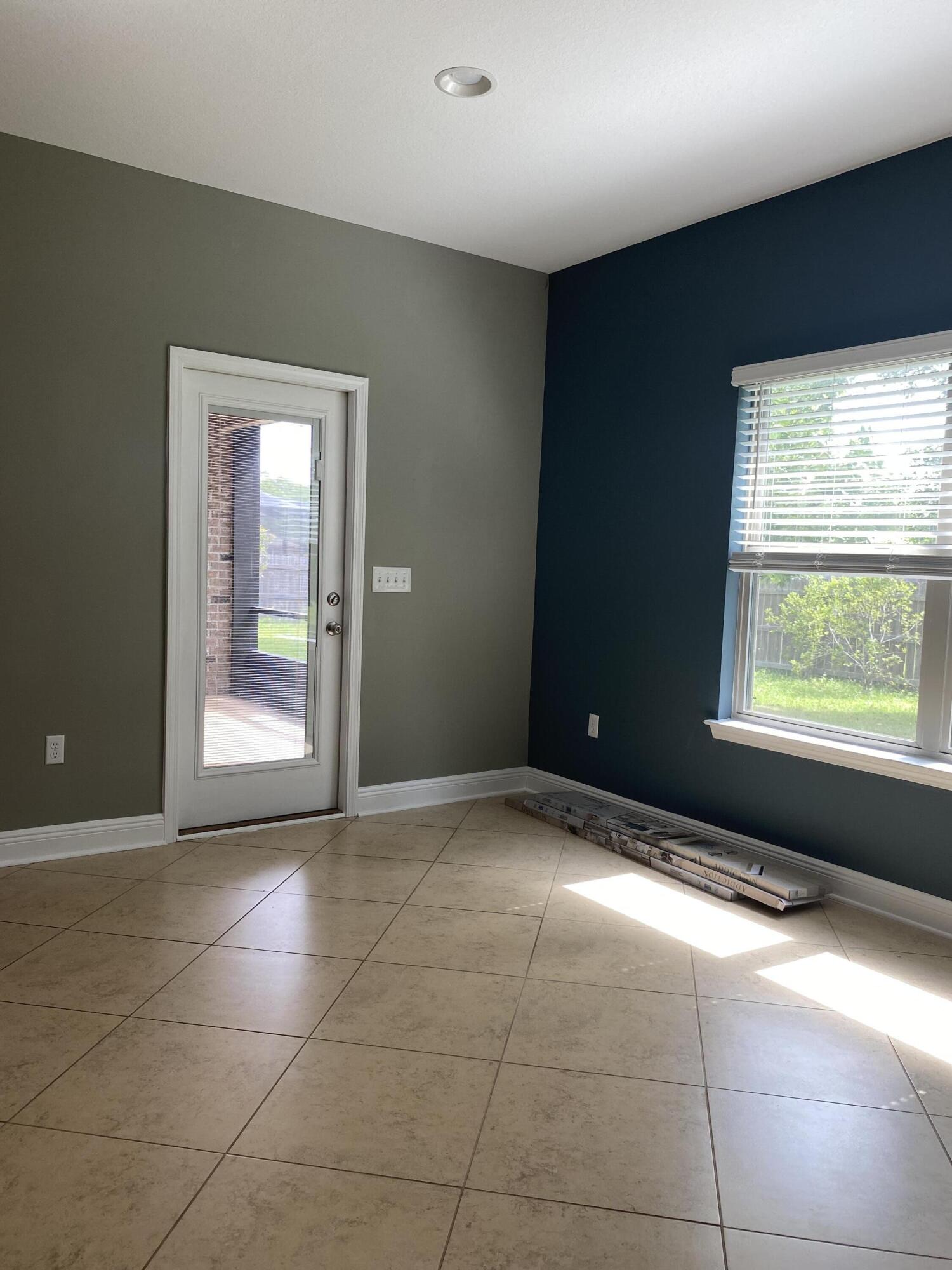 5870 Pescara Drive Pace, FL 32571 - Photo 15 of 31 a view of an empty room and window