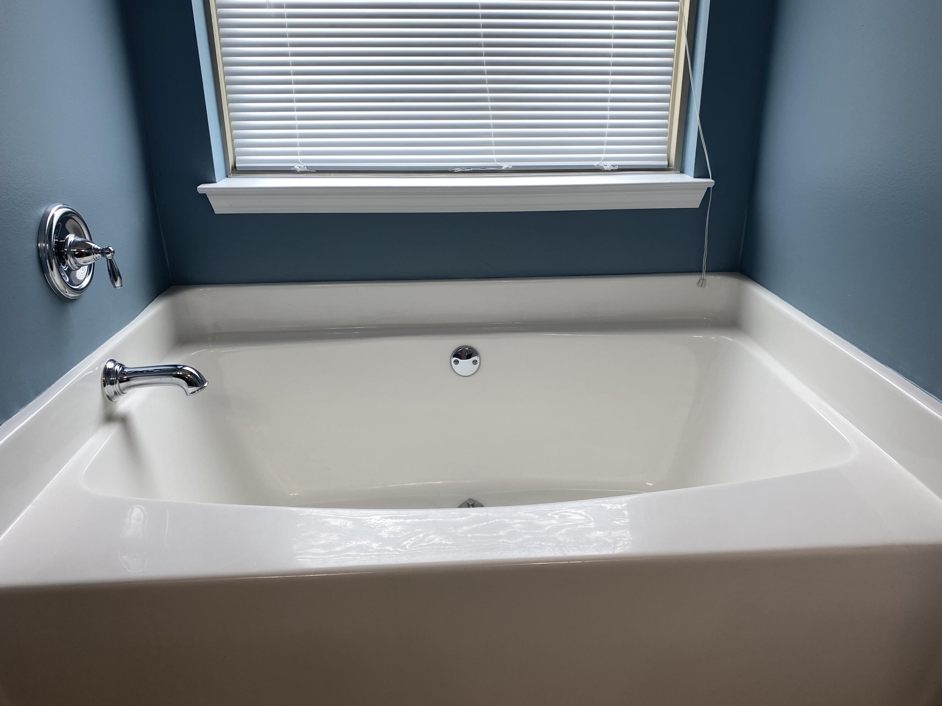 5870 Pescara Drive Pace, FL 32571 - Photo 21 of 31 a bathroom with a bathtub