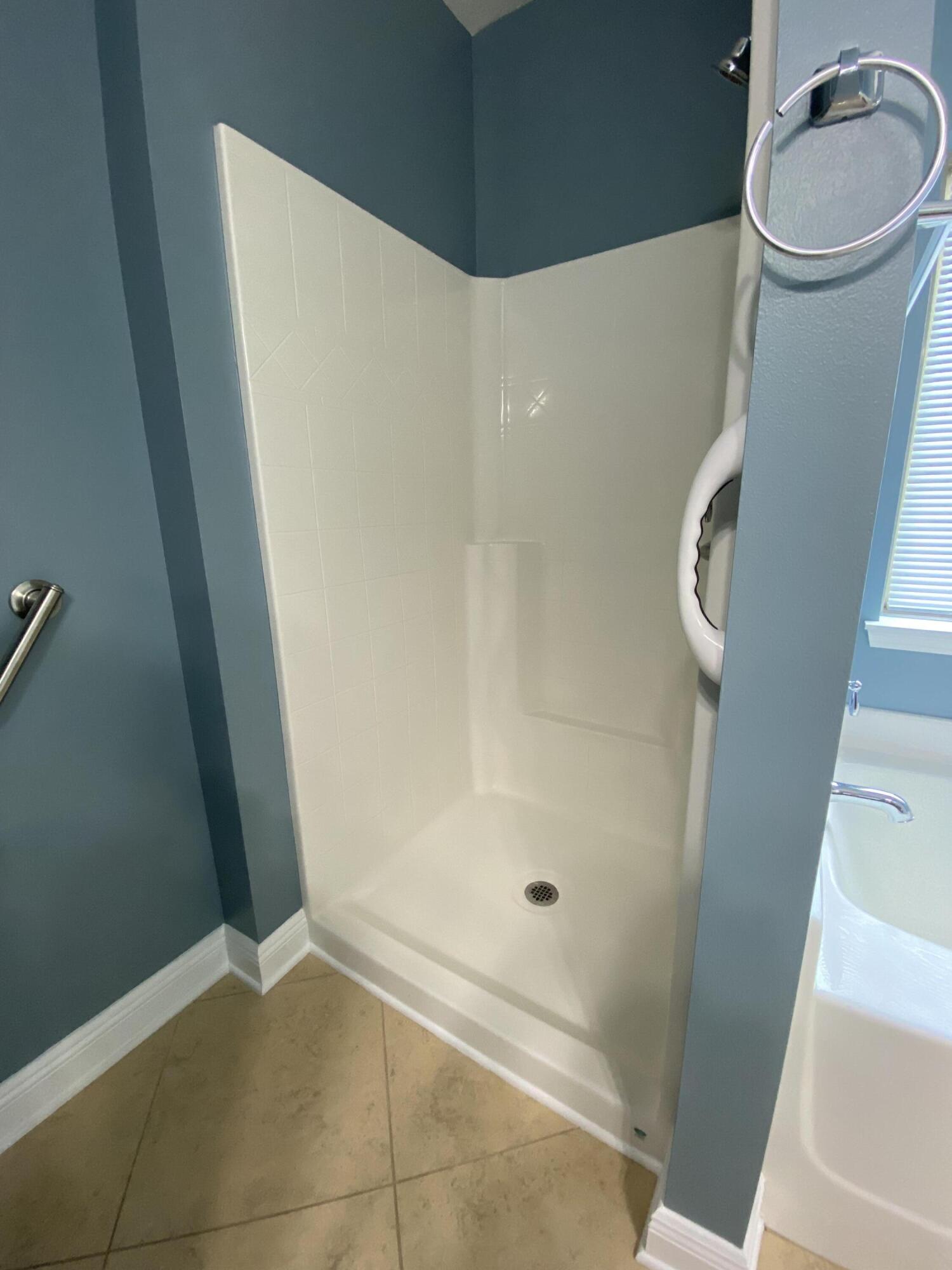 5870 Pescara Drive Pace, FL 32571 - Photo 22 of 31 a bathroom with a sink and a mirror