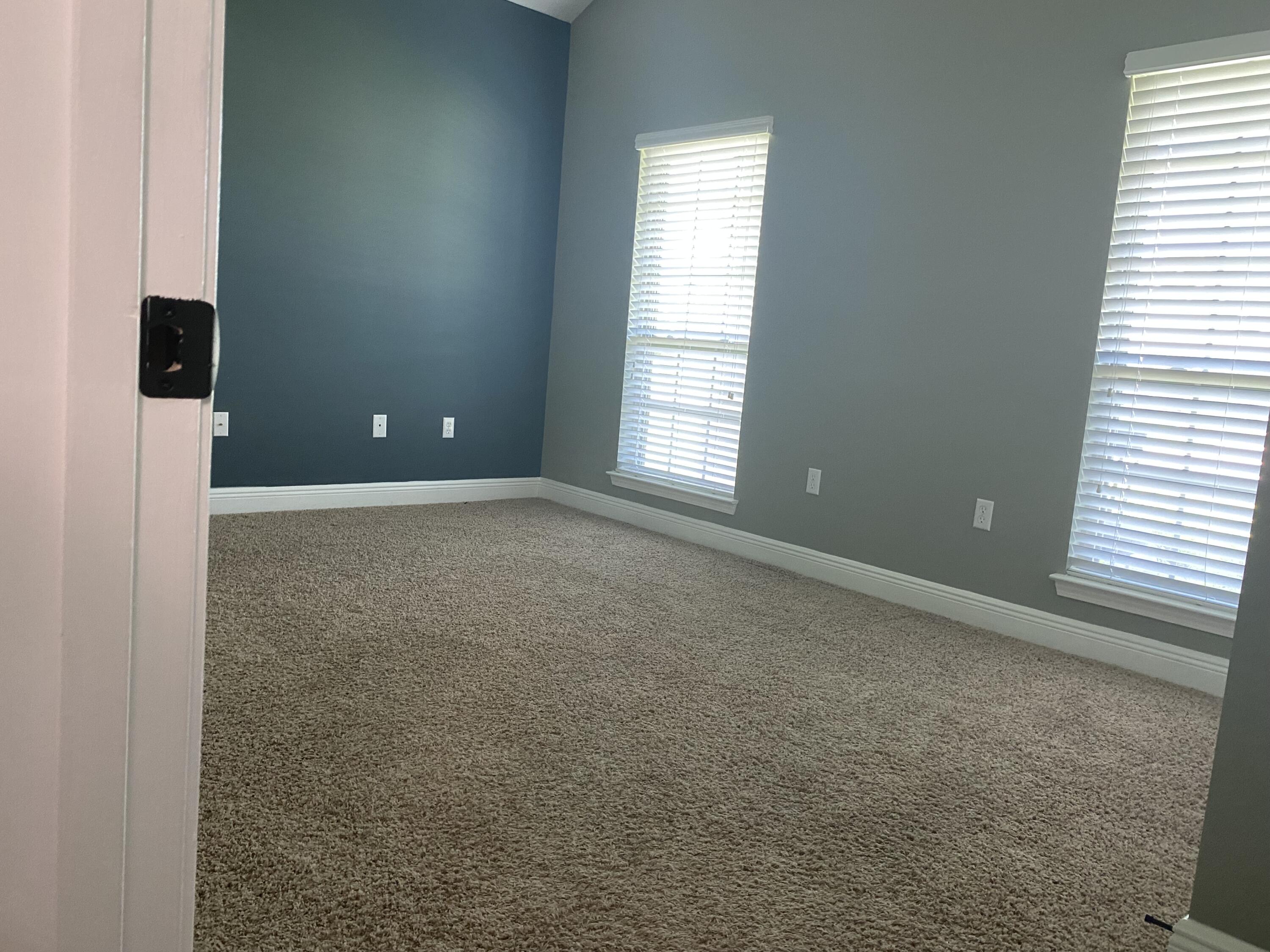 5870 Pescara Drive Pace, FL 32571 - Photo 26 of 31 a view of an empty room with a window