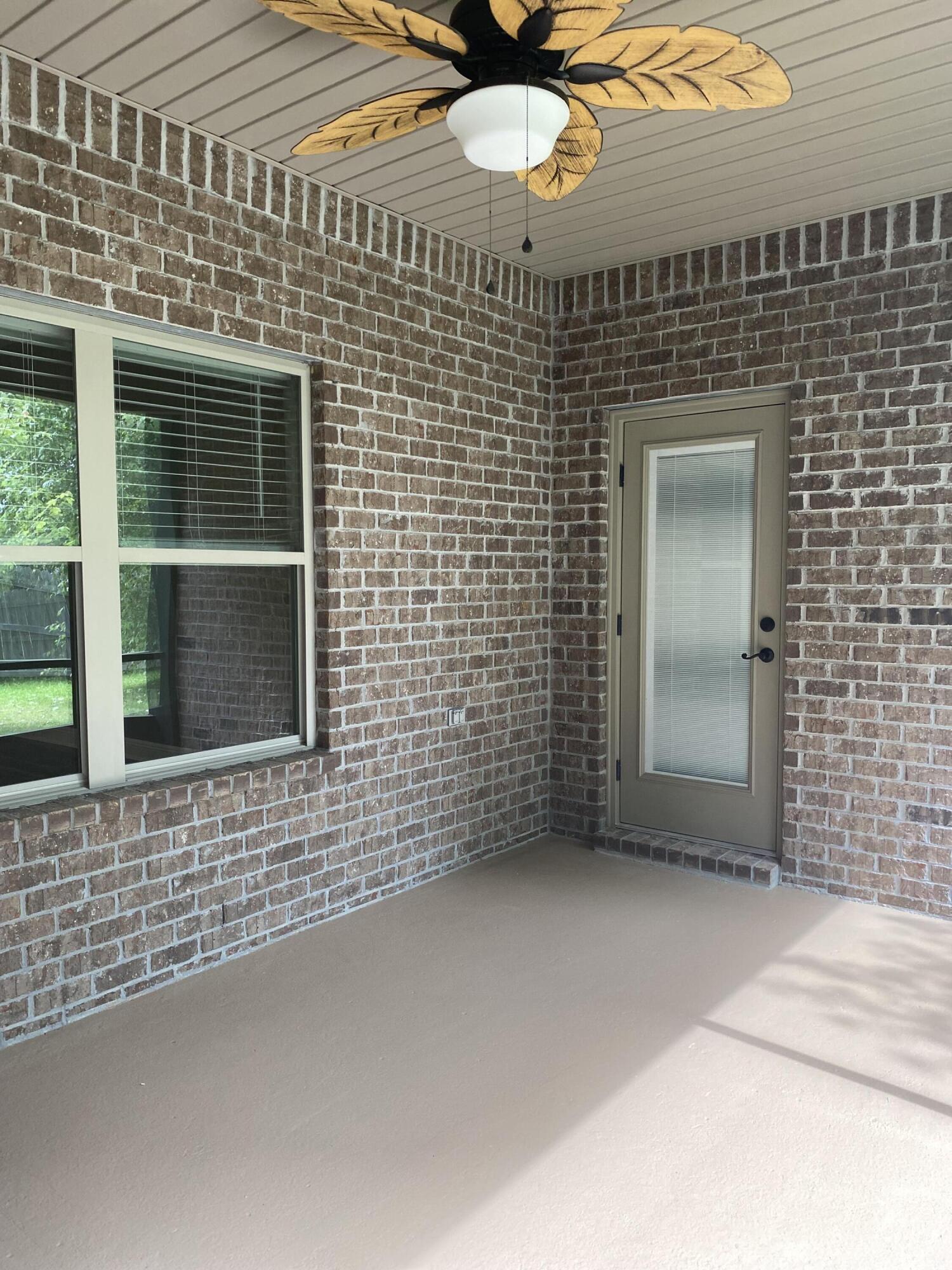 5870 Pescara Drive Pace, FL 32571 - Photo 28 of 31 a view of an entrance of the house