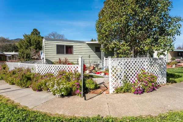 a front view of a house with a garage