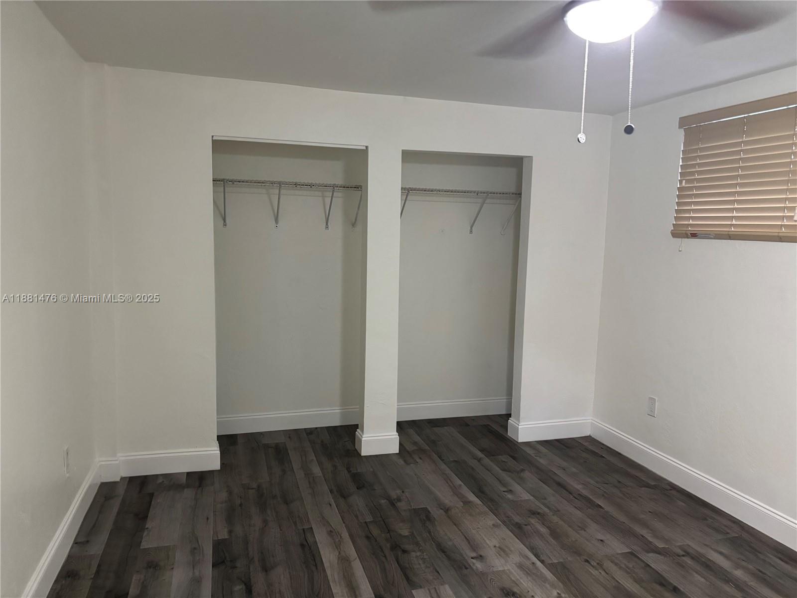 13041 Northwest 17th Court Miami, FL 33167 - Photo 19 of 23 wooden floor in an empty room