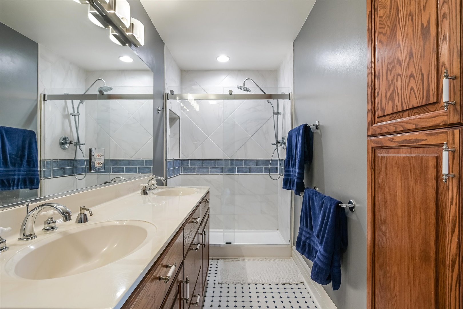 230 Wisner Street Park Ridge, IL 60068 - Photo 21 of 43 a bathroom with a sink a toilet a mirror and shower