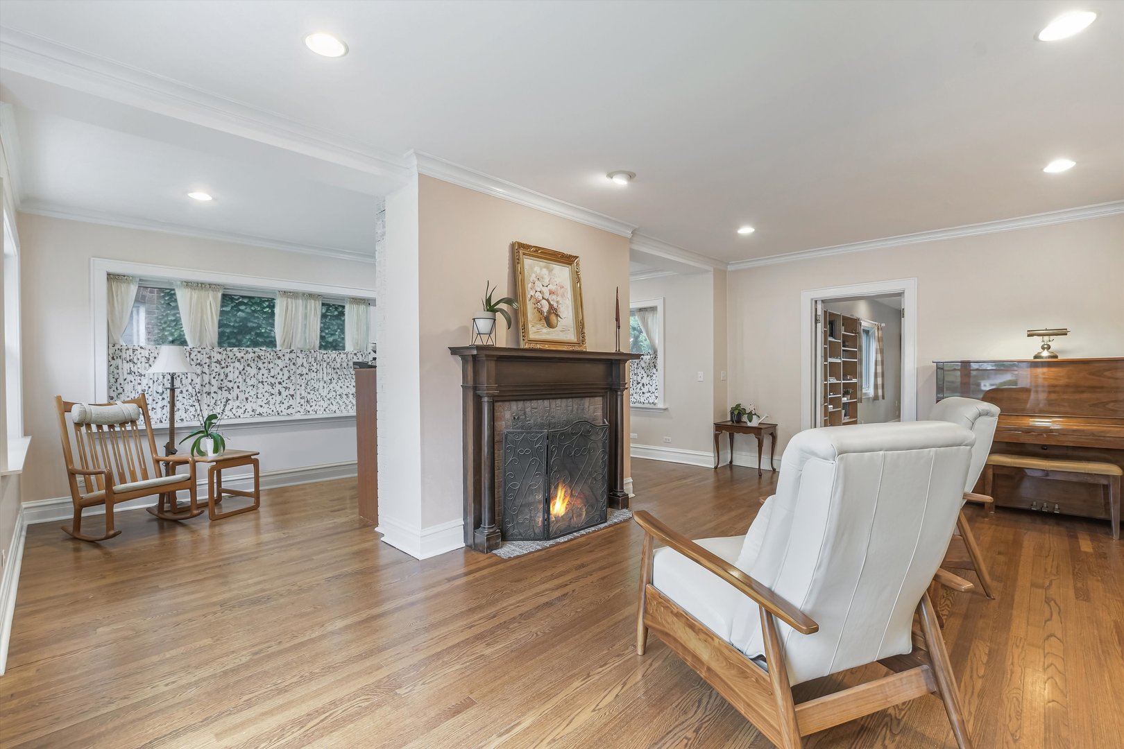 230 Wisner Street Park Ridge, IL 60068 - Photo 3 of 43 a living room with furniture and a fireplace