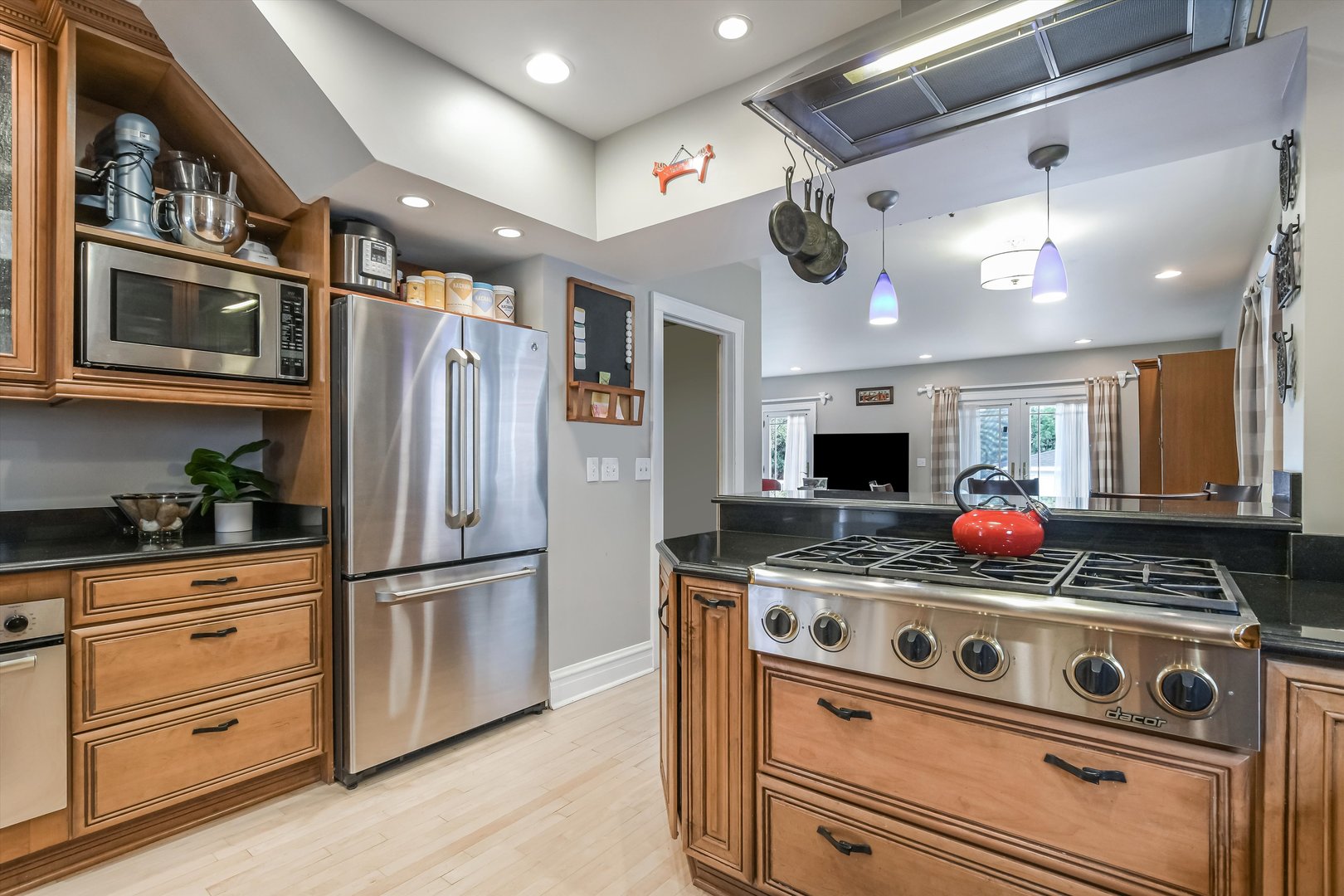 230 Wisner Street Park Ridge, IL 60068 - Photo 10 of 43 a kitchen with stainless steel appliances granite countertop a stove and a refrigerator