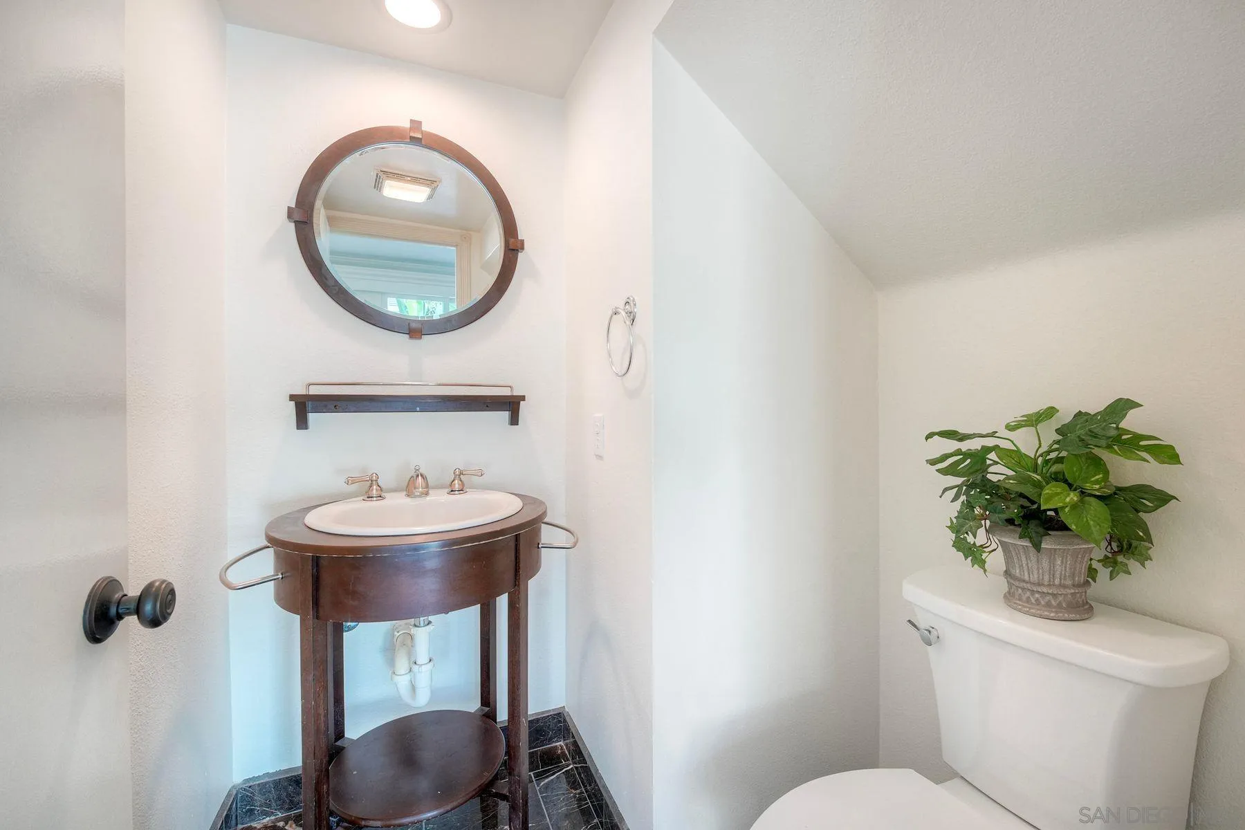 534 Whitesage Road San Marcos, CA 92078 - Photo 17 of 36 1/2 bathroom on first floor