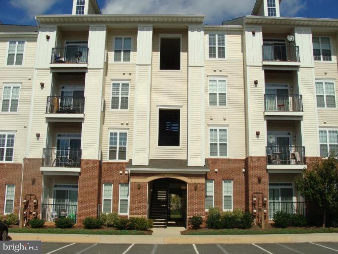 21222 McFadden Square, Unit 209 Sterling, VA 20165 - Photo 1 of 16 Commons at Potomac Square