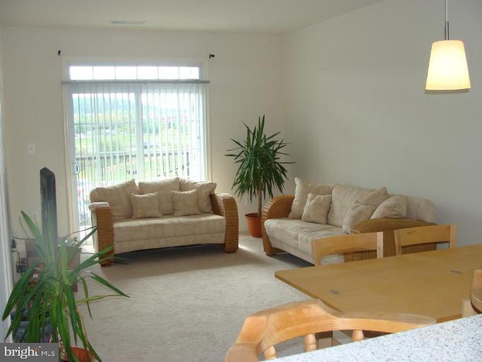 21222 McFadden Square, Unit 209 Sterling, VA 20165 - Photo 5 of 16 Living Room