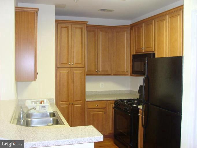 21222 McFadden Square, Unit 209 Sterling, VA 20165 - Photo 8 of 16 Kitchen