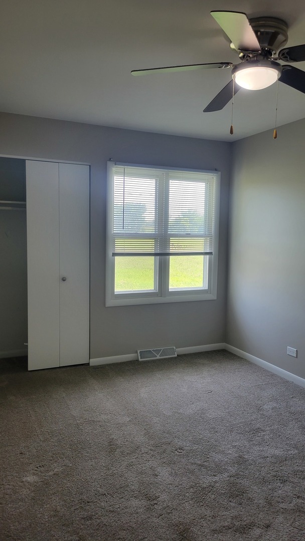 20 Highway Elgin, IL 60124 - Photo 12 of 23 an empty room with windows